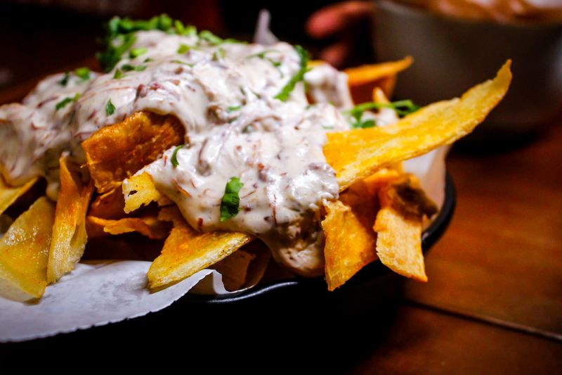 Cafe Rio loaded nachos with cheese and jalapeños